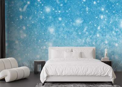 Christmas background with snowy fir trees. snow covered open winter landscape at snowfall, snowy trees with blue sky background 3D illustration. Winter snowfall and snowflakes on light blue background Wall mural