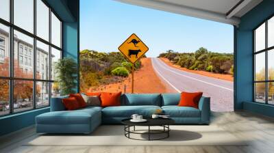 Beware of kangaroo road sign in Australian outback. Warning sign for kangaroos and cows crossing the road Wall mural