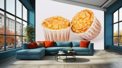 Two cupcakes on a white background under a tenderloin Wall mural