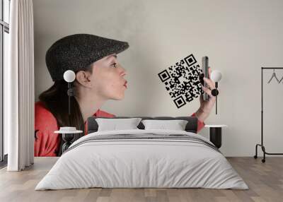 Qr code, woman sends a kiss, the symbol leaving the mobile scree Wall mural