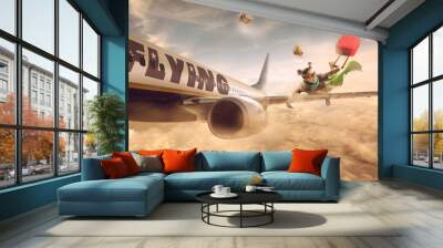 Woman flying in the wing of a moving plane, over clouds with luggage, lowcost holiday Wall mural