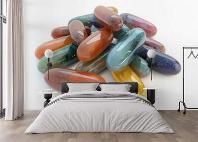 Pile of multivitamin capsules their glossy surfaces reflecting light isolated on white emphasizing their role in daily wellness routines Wall mural