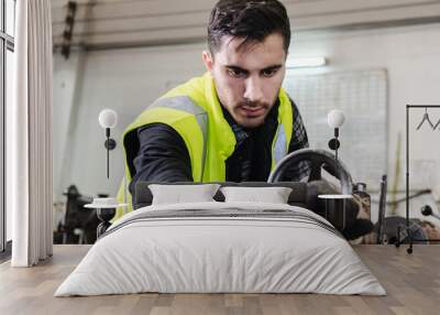 The worker producing the manufacturing metal parts Wall mural