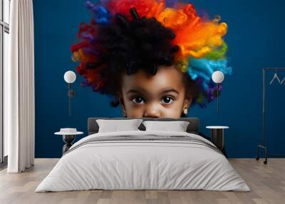 funny studio portrait of black baby with rainbow hair Wall mural