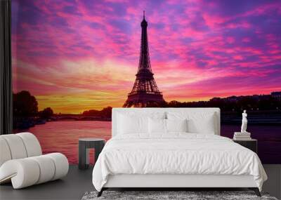 Eiffel Tower at Sunset: The Eiffel Tower silhouetted against a vibrant sunset sky, with the Seine River in the foreground.
 Wall mural