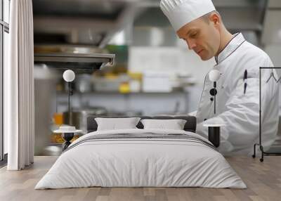 Man in White Chef's Uniform: A man in a white chef's uniform, preparing a dish in a professional kitchen.
 Wall mural