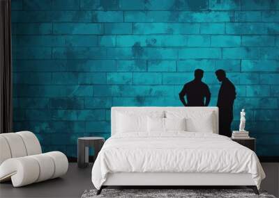 Two silhouettes stand near buckets against a textured blue wall, suggesting a creative process or artistic collaboration. Wall mural