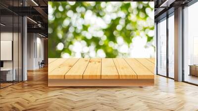 wood floor with blurred trees of nature park background and summer season, product display montage Wall mural