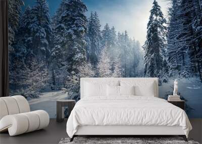 Snowy nordic forest landscape, against blue sky on a sunny winter day Wall mural