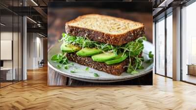 delicious vegan sandwich featuring fresh avocado slices and crunchy sprouts, served on whole grain bread. This healthy meal is perfect for nutritious lunch or snack Wall mural