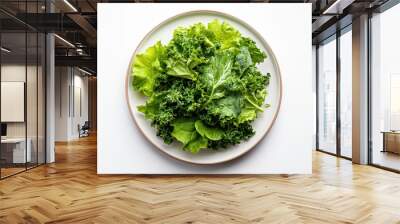 Fresh kale and spinach arranged beautifully on plate, showcasing vibrant green colors and textures. This minimalist presentation highlights natural beauty of these leafy greens Wall mural