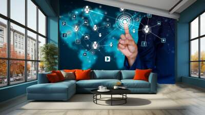 Communication technology network world map businessman pressing modern social buttons on a virtual background Wall mural