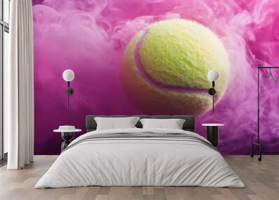 A tennis ball is sitting on top of pink smoke Wall mural