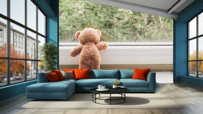 Bear stood looking out the window, do not be sad. Wall mural