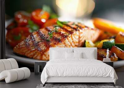 Delicious grilled salmon fillet served with vibrant sauteed vegetables and cherry tomatoes on a rustic plate. Wall mural