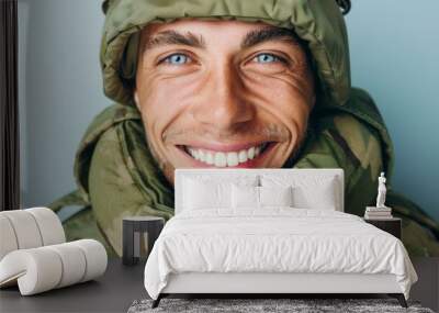  Soldier in uniform showing a big happy smile. Wall mural