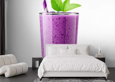 Refreshing blueberry smoothie in a glass with a straw, blueberries, and mint leaves. Perfect for summer. Wall mural