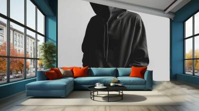 black hoodie standing against white wall, mockup of hoodie with logo or graphic on the chest or sleeve Wall mural