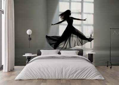 woman in black dress is dancing, dancer's silhouette leaping gracefully, the movement of her dress animated by negative space Wall mural