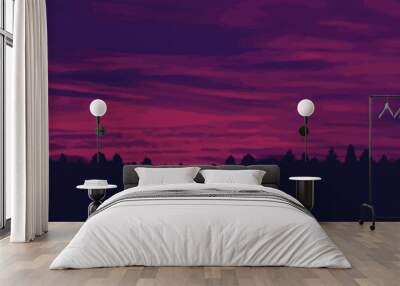 Purple sunset in a pine forest with trees silhouette Wall mural