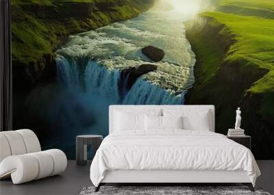 A dramatic aerial shot of Gullfoss waterfall, showing the full extent of the water's power as it crashes into the canyon with lush green fields on either side. Wall mural