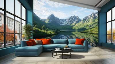 Beautiful mountain landscape featuring lush green valleys, a clear blue sky, and a serene lake reflecting the scenery Wall mural