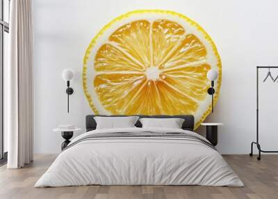 Close-up of a single lemon slice with exposed pulp on a pristine white background, emphasizing its natural texture and freshness. Wall mural