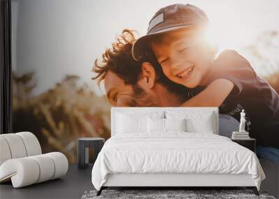 Father, bonding kiss and boy child hug happy in nature with quality time together outdoor Wall mural