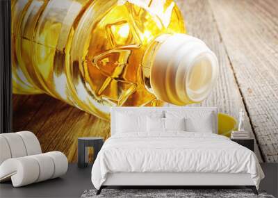 Vegetable oil in plastic bottle closeup Wall mural