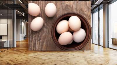 fresh uncooked brown hen eggs. Top view Wall mural