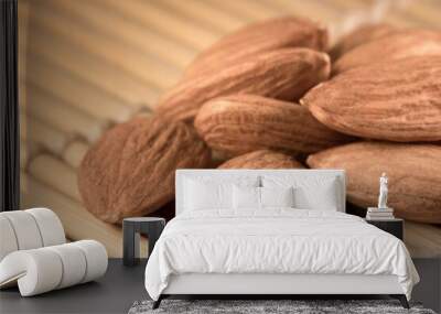 a healthy almond on a wooden background with soft lighting Wall mural