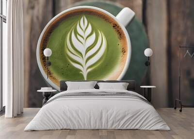 Matcha latte with beautiful latte art on an old wooden table, top view. Wall mural