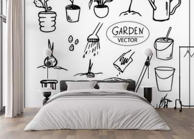 Set of vector garden tools. Drawn by hand in the doodle style with a black outline, isolated on a white background. For the design of garden shops, instructions for seeds, farm designs,flower business Wall mural