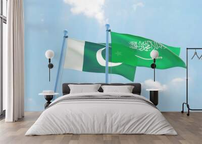 Saudi Arabia and Pakistan, two flags waving against blue sky. 3d image Wall mural