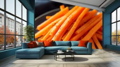 A plate of freshly sliced raw carrots. Wall mural