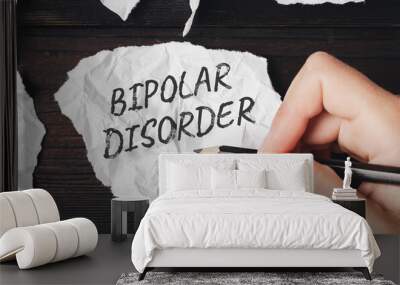 Bipolar disorder - inscription on crumpled paper. Mood disorders Wall mural