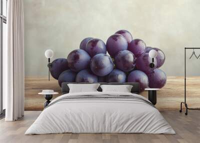 Bunch of fresh purple grapes on a wooden table. Wall mural