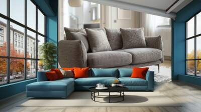 Gray modern sofa in a stylishly decorated living room Wall mural