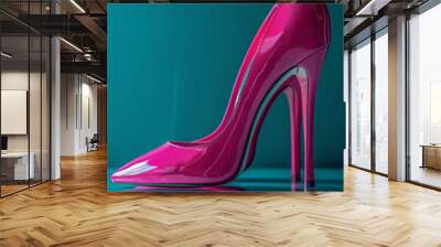 Pink high heel stiletto shoe on teal background reflecting light. Wall mural