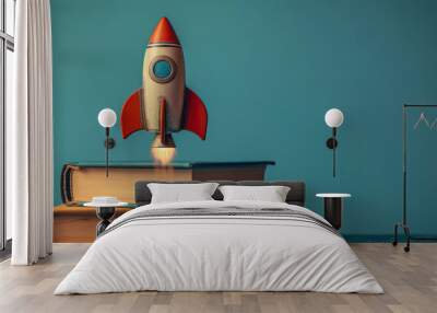 Toy rocket launching from a stack of books, symbolizing creativity. Wall mural