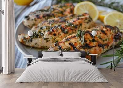 Tasty grilled chicken fillets with garlic, lemon and sauce Wall mural