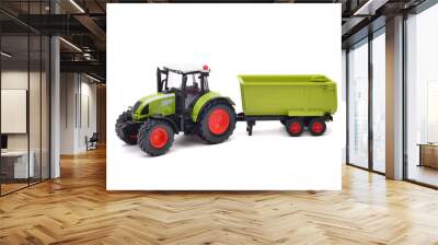 farm green toy tractor with empty trailer, isolated on white background. Copy space background Wall mural