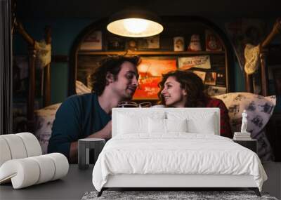 Couple drinking beer in their bed. Wall mural