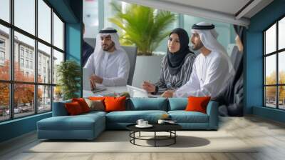 Group of middle-eastern corporate business people wearing traditional emirati clothes meeting in the office in Dubai - Business team working and brainstorming in the UAE Wall mural