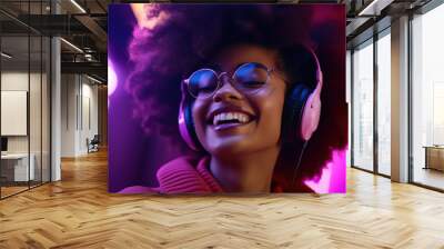 Happy cool fashion funky African young black hipster lady wears trendy glasses headphones listening dance pop dj music standing in neon night club light at style party. Translation: Chicken laugh Wall mural