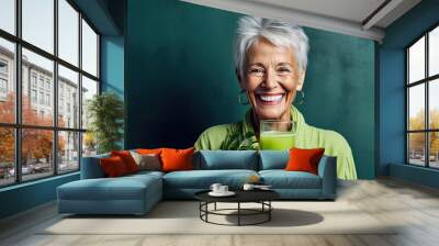 Healthy senior woman smiling while holding some green juice, Generative AI Wall mural