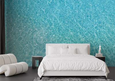 Aerial view of the Overhead view of crystal clear water on beach background Wall mural