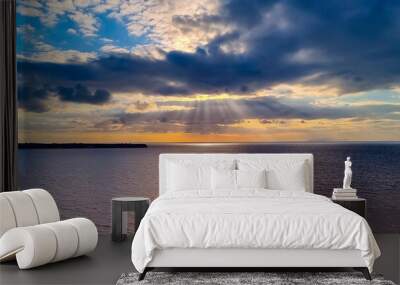 The sunbeam scene with the tropical summer sky scene and wave water seashore background Wall mural