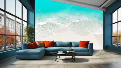 Top view of turquoise color of  wave water background on the summer beach at the seashore and  white  sand beach -Summer pattern image Wall mural