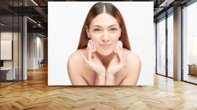 Portrait of a beautiful young woman with cotton pads Wall mural